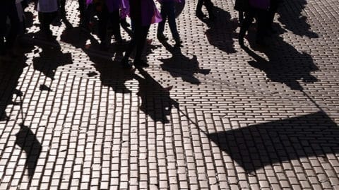 Shadows of marchers