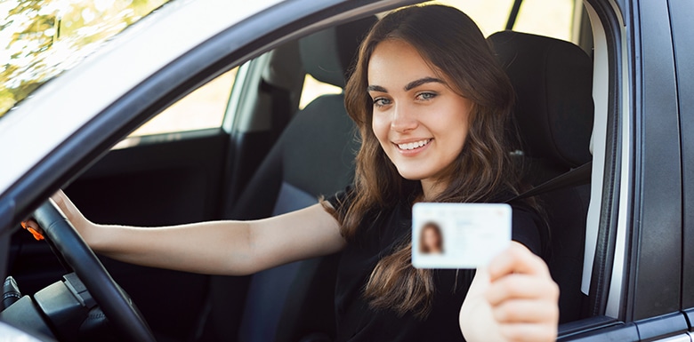 Young woman with driver's license
