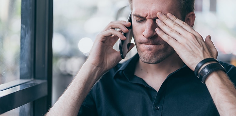 Angry man yelling on phone call