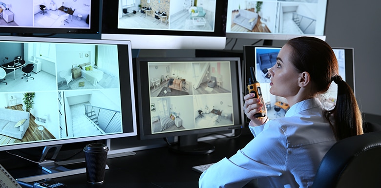 Policewoman looking at camera screens