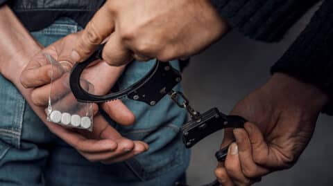 Man being handcuffed because of drug possession in Cincinnait, Ohio